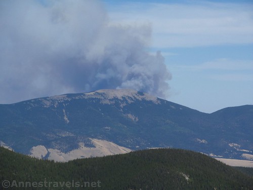 Smoke billows from behind Touch-Me-Not Mountain - the fire would close down all trails in the Cason National Forest the next day in New Mexico
