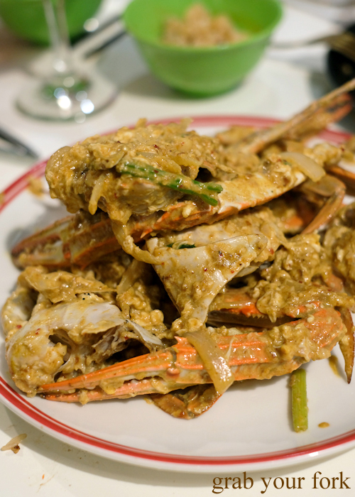Blue swimmer crabs in curry sauce at the all you can eat prawn and crab buffet at Mojo Restaurant Sydney