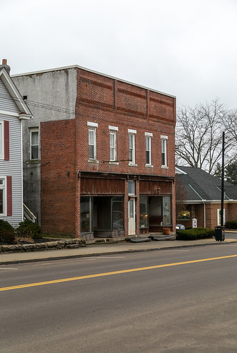 commercial building structure historic twostory centerburg ohio unitedstates us brick knoxcounty storefront corbelling corbelled 11windows stone lintels sills street sidewalk kno26120