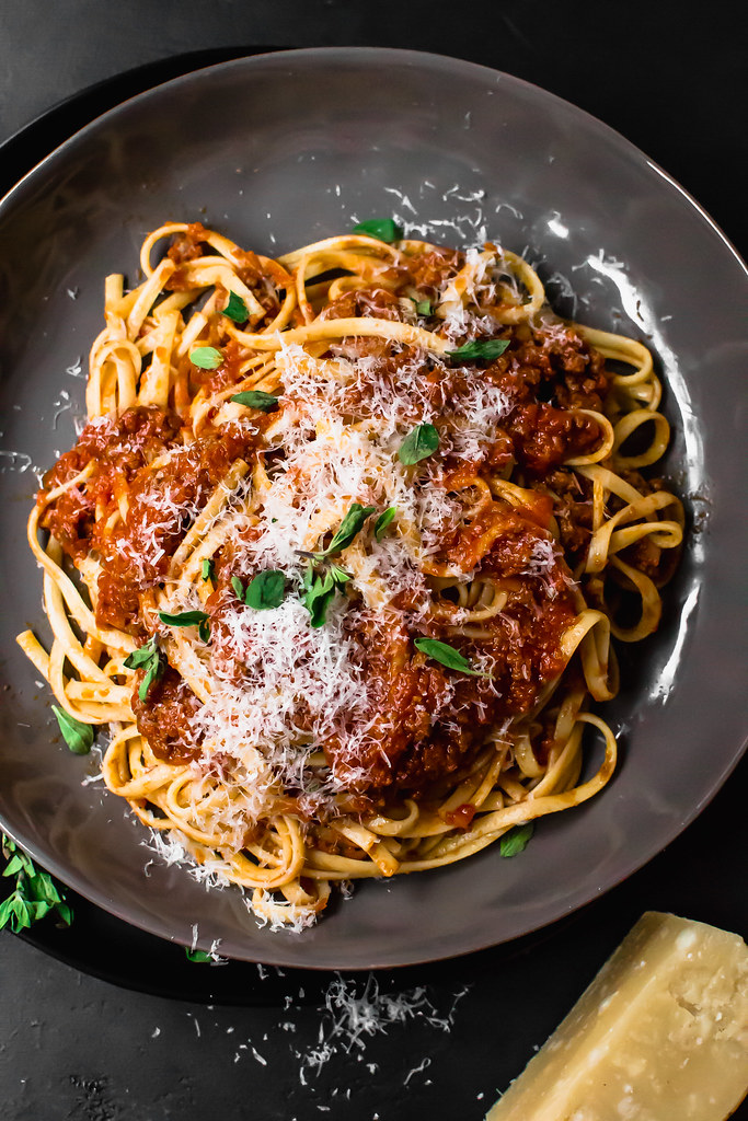 Serve traditional bolognese sauce with a healthy grating of fresh Parmesan cheese.