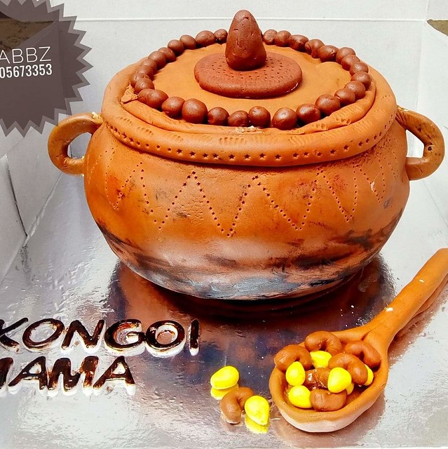 This a traditional African pot with some traditional food on the spoon..everything is edible. By Tabbz Muthoni Tasha