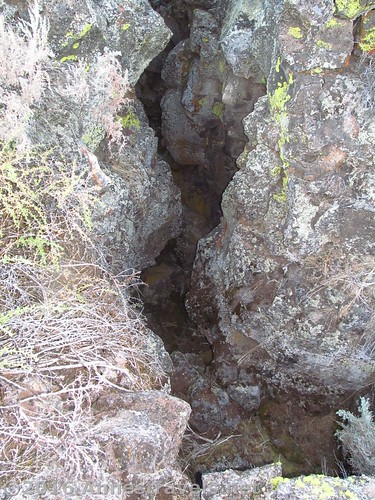 Looking down into the Big Crack, Lava Beds National Monument, California