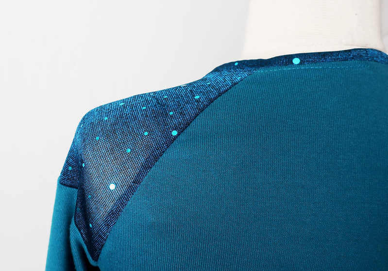 teal knit top close up fabric