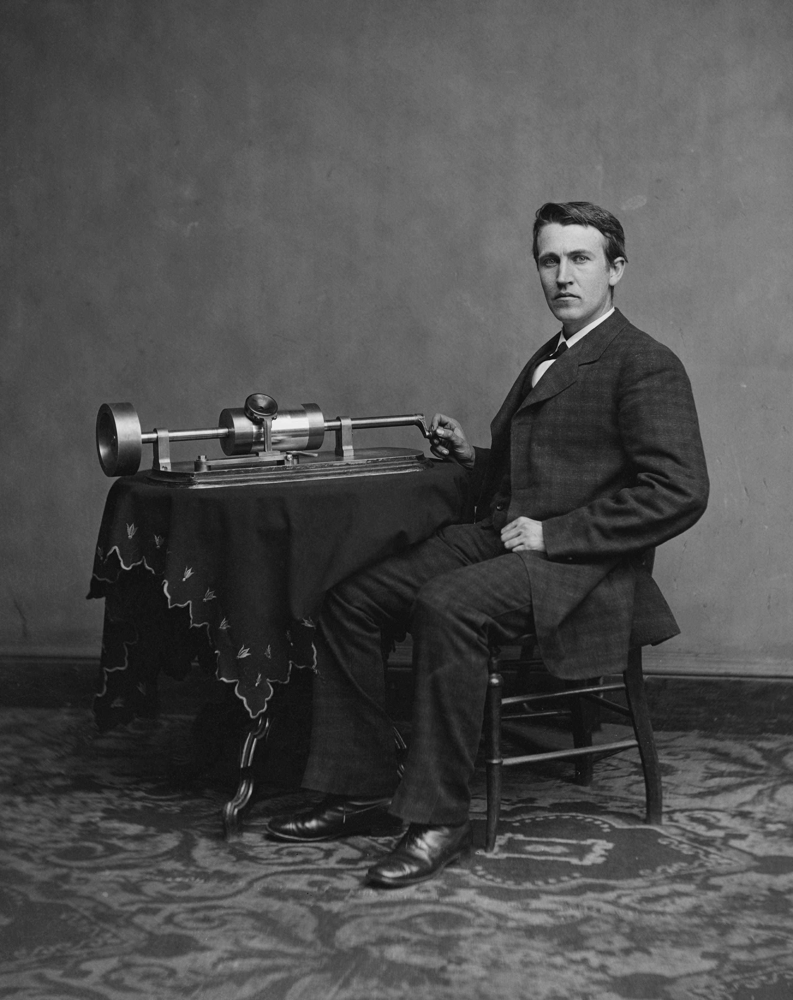 Edison with his phonograph (2nd model), taken in Mathew Brady's Washington, D.C. studio by Levin C. Handy likely on April 18, 1878. Currently in the Brady-Handy Photograph Collection of the Library of Congress, Washington, D.C. Reproduction Number: LC-DIG-cwpbh-04326 (digital file from original negative)