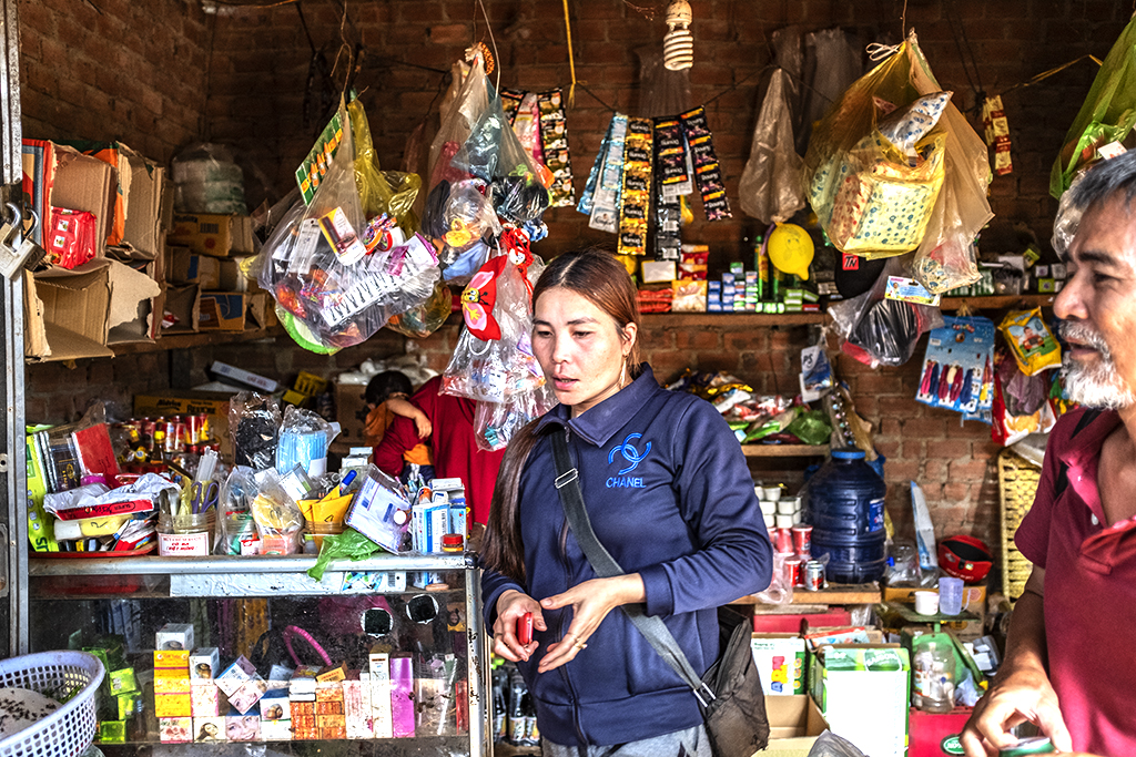 Vietnamese shop owner in a Rade village 3--Ea Kly
