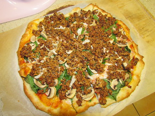 Spinach, Onion, Mushroom, and Sausage Pizza